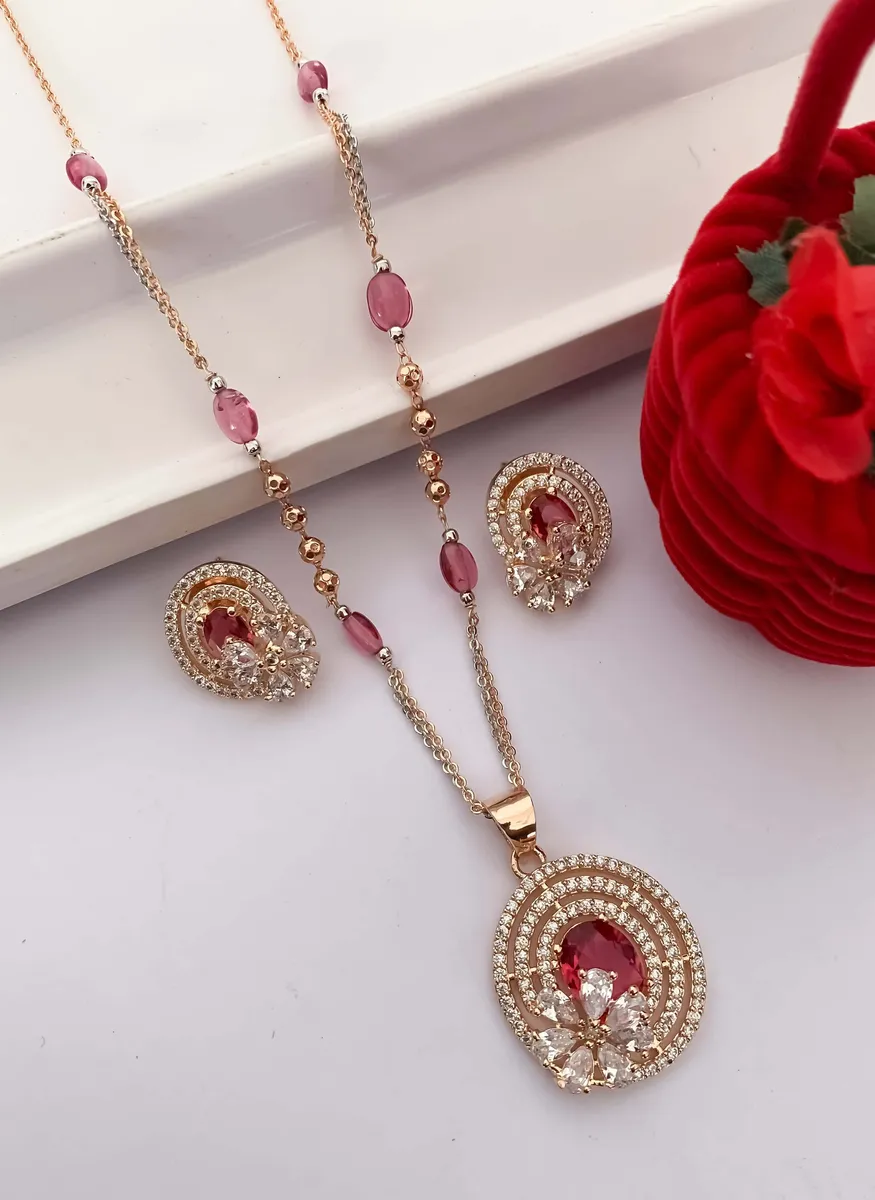 Rose Gold Finish Ruby Oval Pendant Necklace Set with Matching Stud Earrings